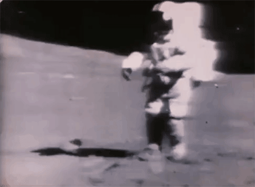 astronauts-tripping-and-falling-over-on-the-moon.gif